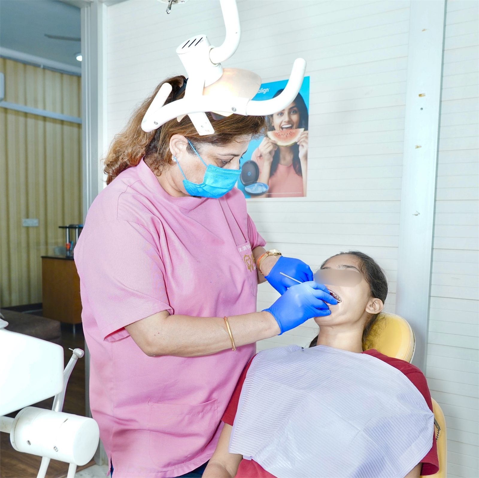Dentist treating a patient at Marwaha Dental Clinic in Gurugram